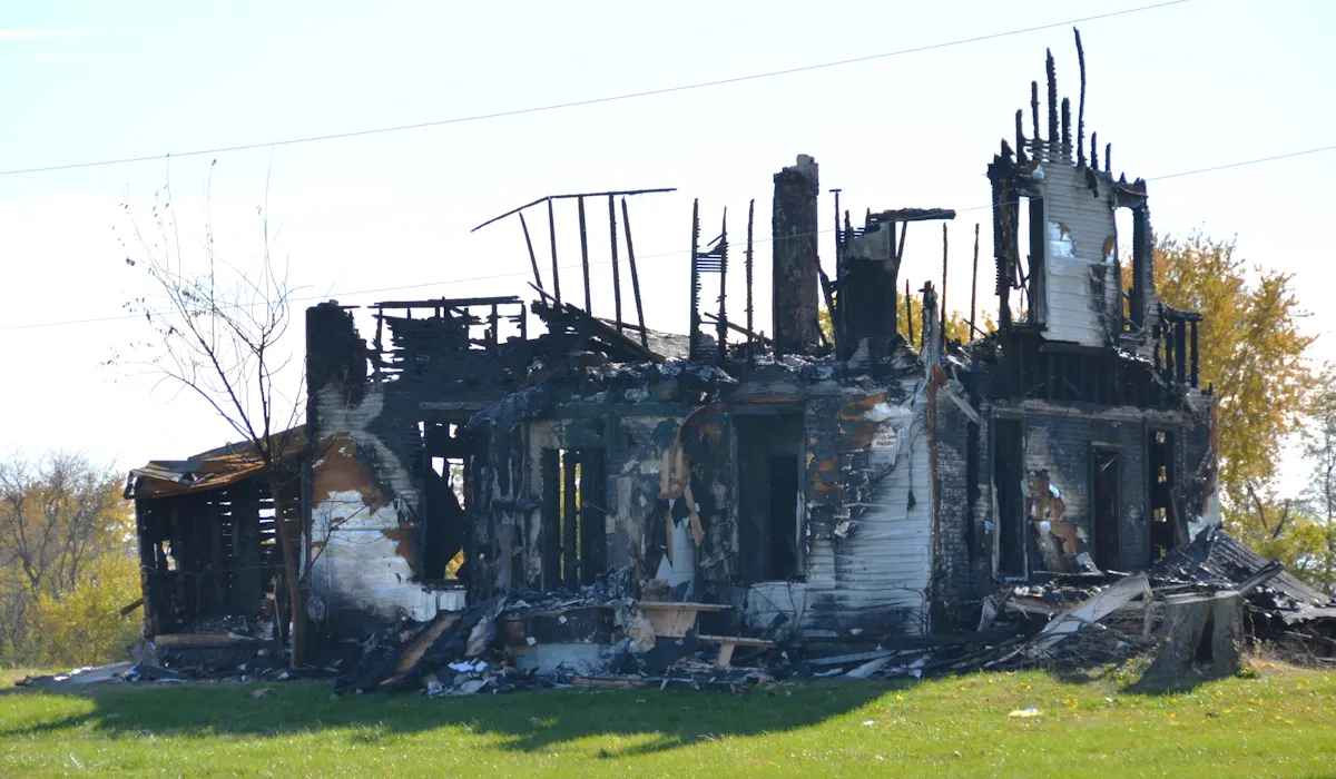 Fire-damaged house in Spokane County awaiting a demolition permit